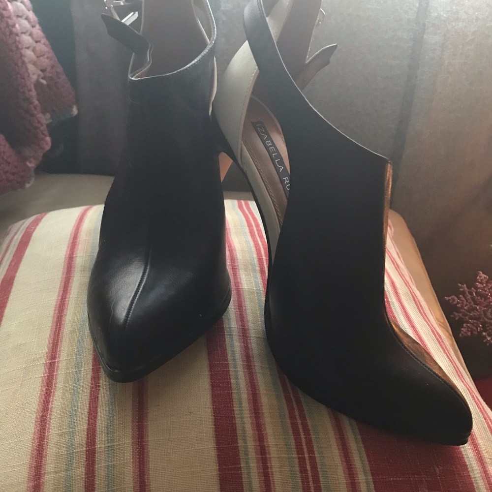 Beautiful unique black and white heels. NWOT
